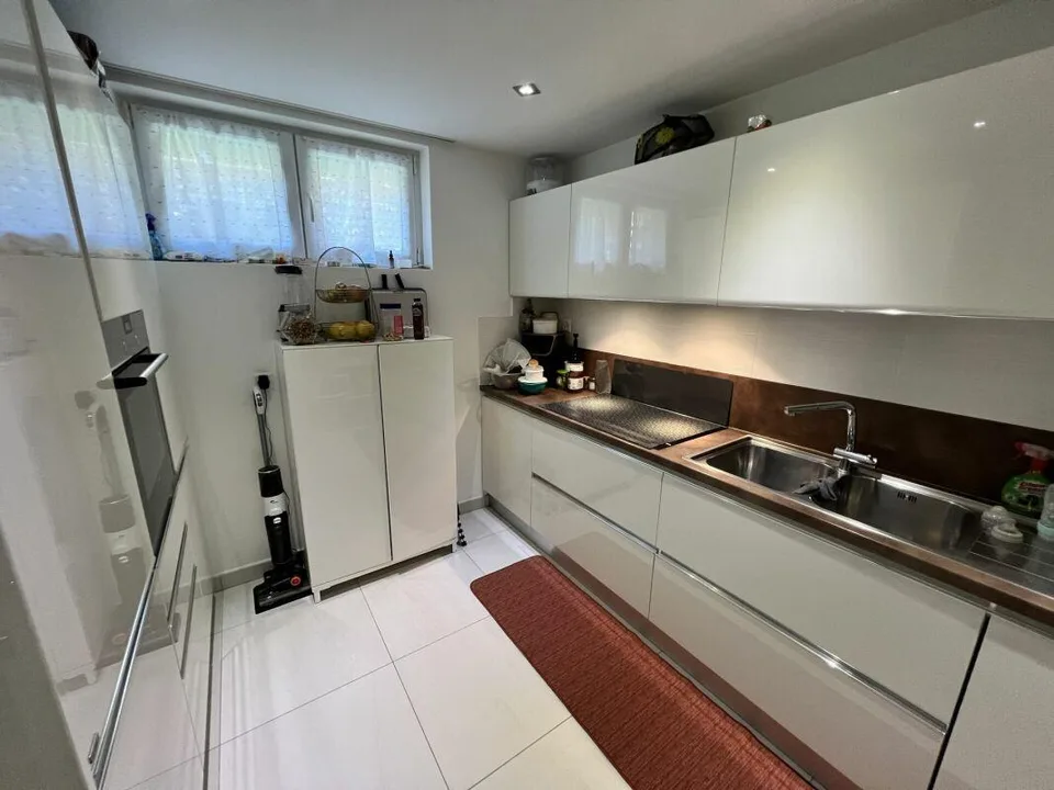 Casa Uni-bifamilare di 3.5 + 3.5 locali con giardino – Foto 7 von 28