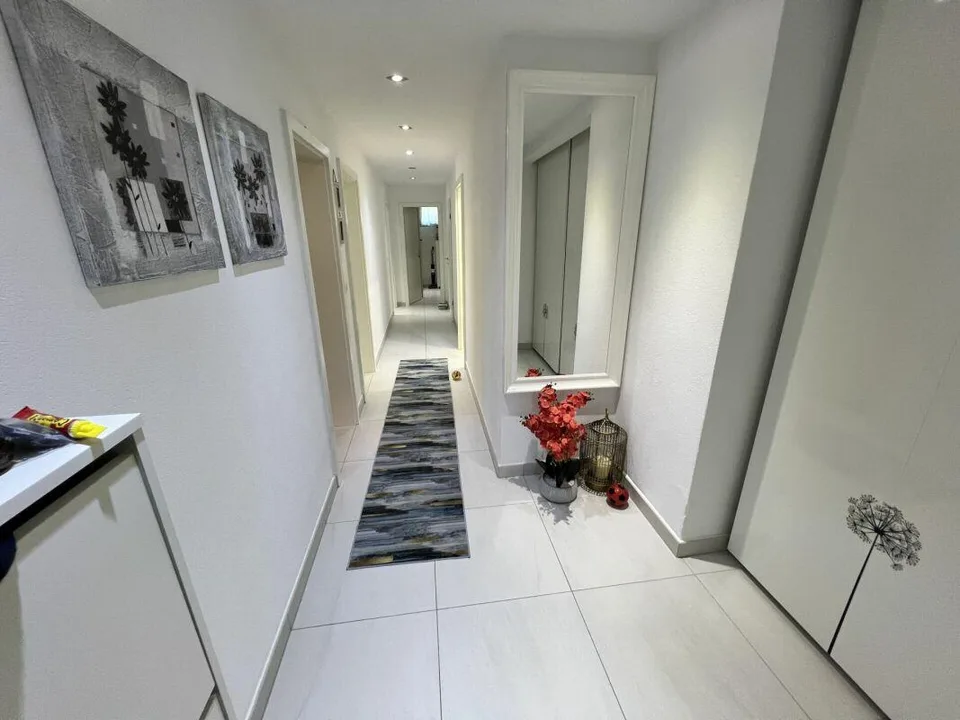 Einfamilien-/Zweifamilienhaus mit 3,5 + 3,5 Zimmern und Garten