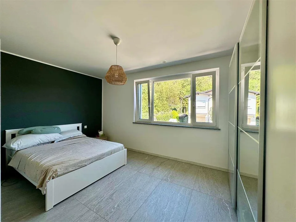 Villa mitoyenne moderne avec jardin privé à Arzo, norme minergie – photo 7 sur 11