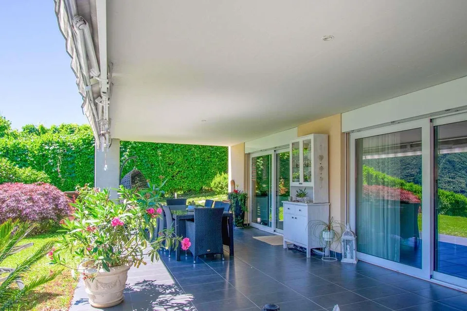 Appartamento mit Seeblick und Garten
