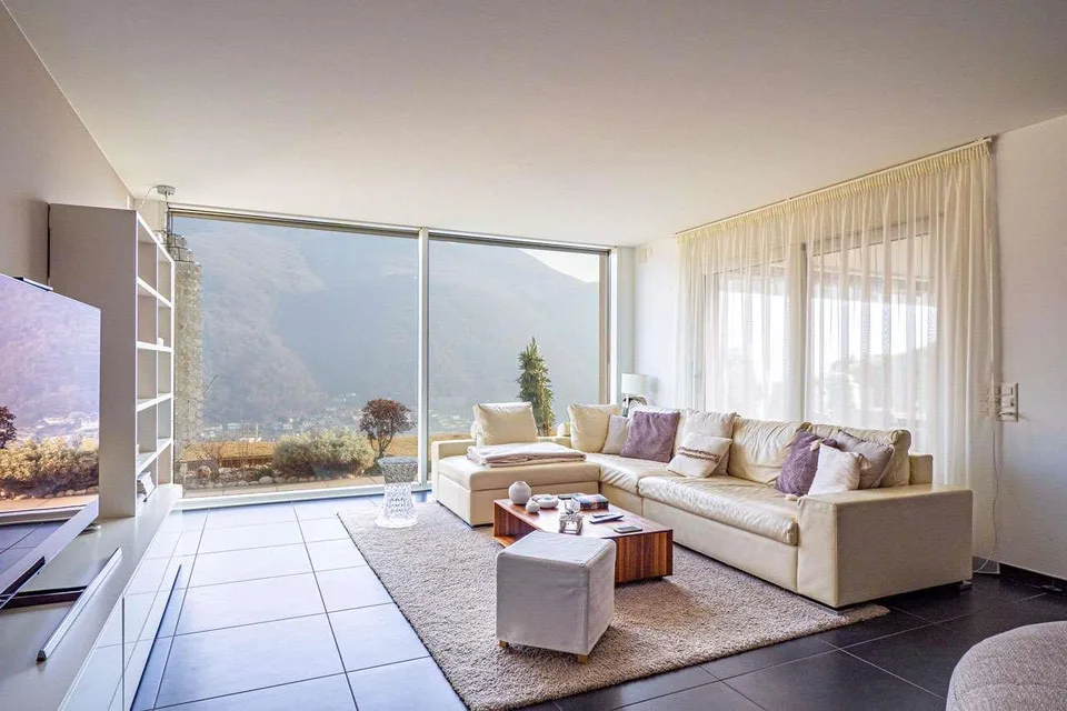 Appartamento mit Seeblick und Garten