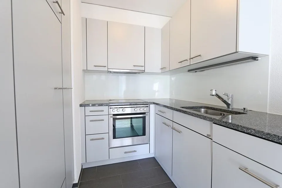 Charmant appartement 2.5 pièces au rez-de-chaussée avec terrasse
