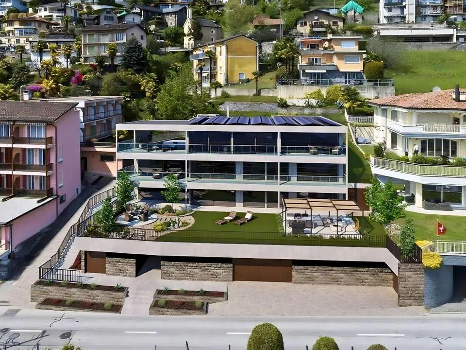 Moderno e prestigioso appartamento di 4.5 locali con terrazza, giardino privato attrezzato e spettacolare vista lago – foto 8 di 9