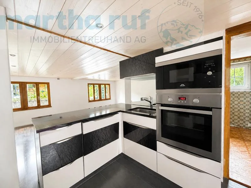 Traditionelles, angebautes Einfamilien-Ferienhaus mit alpinem Charm