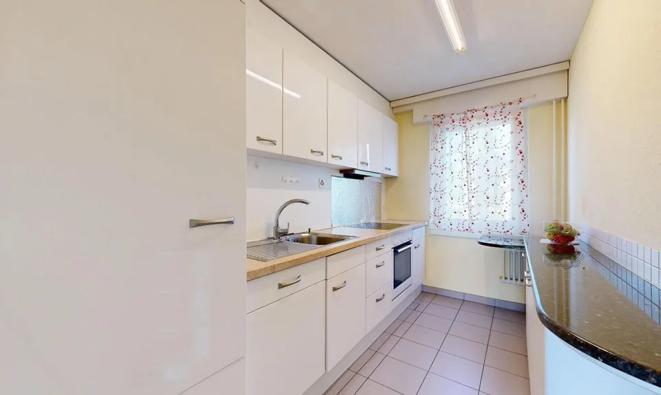 Ruhig gelegene 5-Zimmer-Wohnung mit Balkon und Tiefgaragenplatz