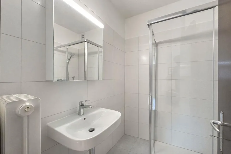 Un coin de paradis: 3.5 pièces avec jardin privé au coeur de Muralto – photo 10 sur 11