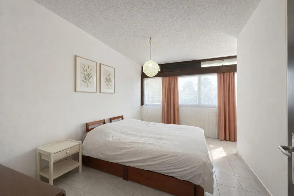 Un coin de paradis: 3.5 pièces avec jardin privé au coeur de Muralto – photo 8 sur 11