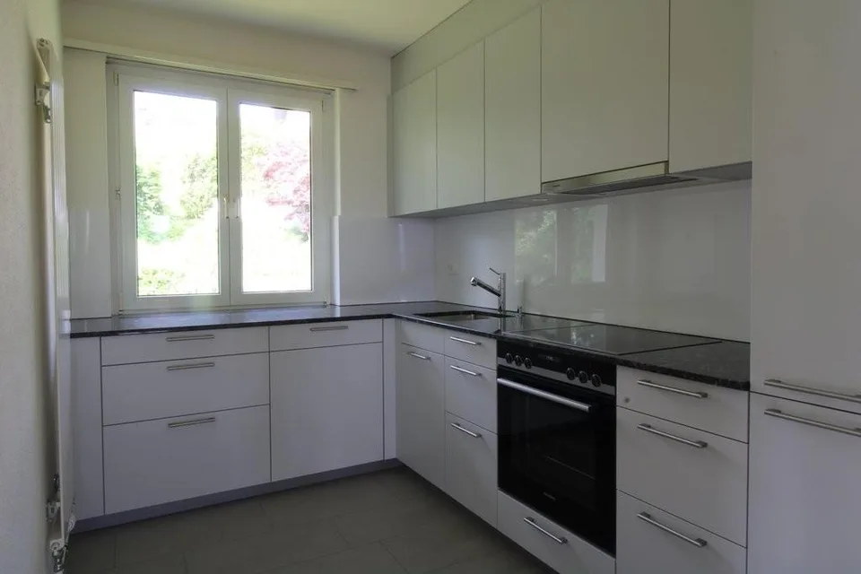Charmante 4.5 Zimmer Wohnung mit Balkon und Cheminée
