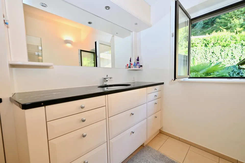 Elegante Attico Duplex con Vista Spettacolare sul Lago di Lugano – foto 19 di 26