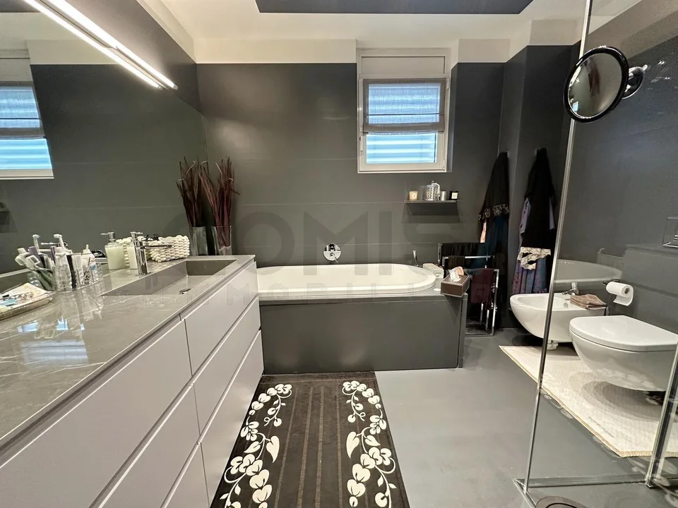 Viganello-Lugano Elegante appartamento 5.5 locali con giardino privato