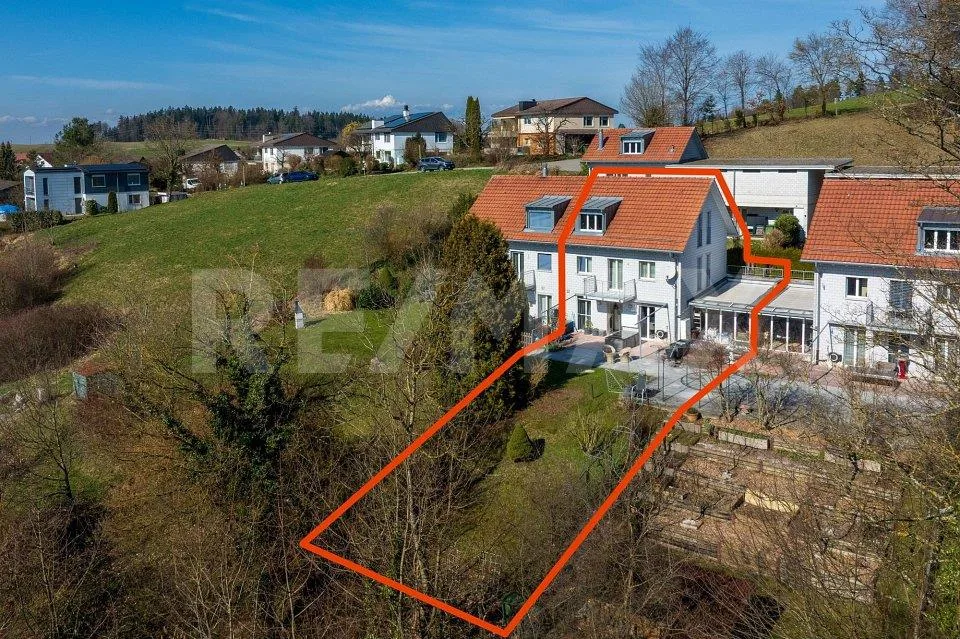 Einseitig angebautes Einfamilienhaus mit Wintergarten