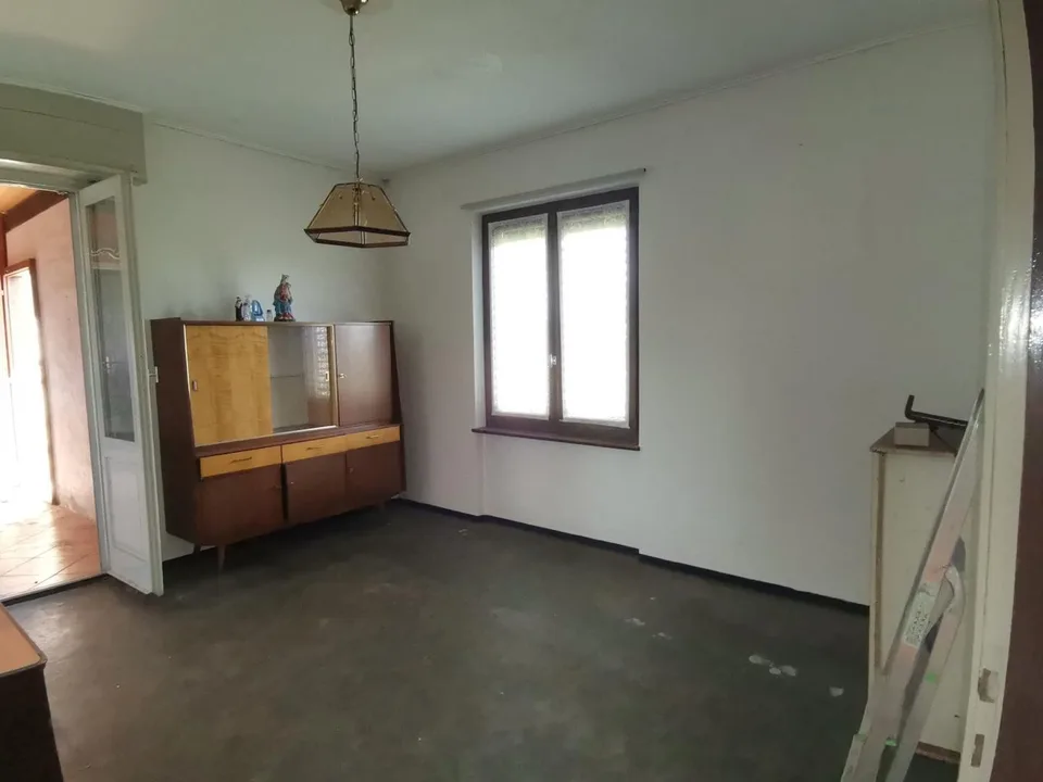 Casa di 4 1/2 locali con giardino e terreno edificabile molto tranq... – Foto 6 von 19