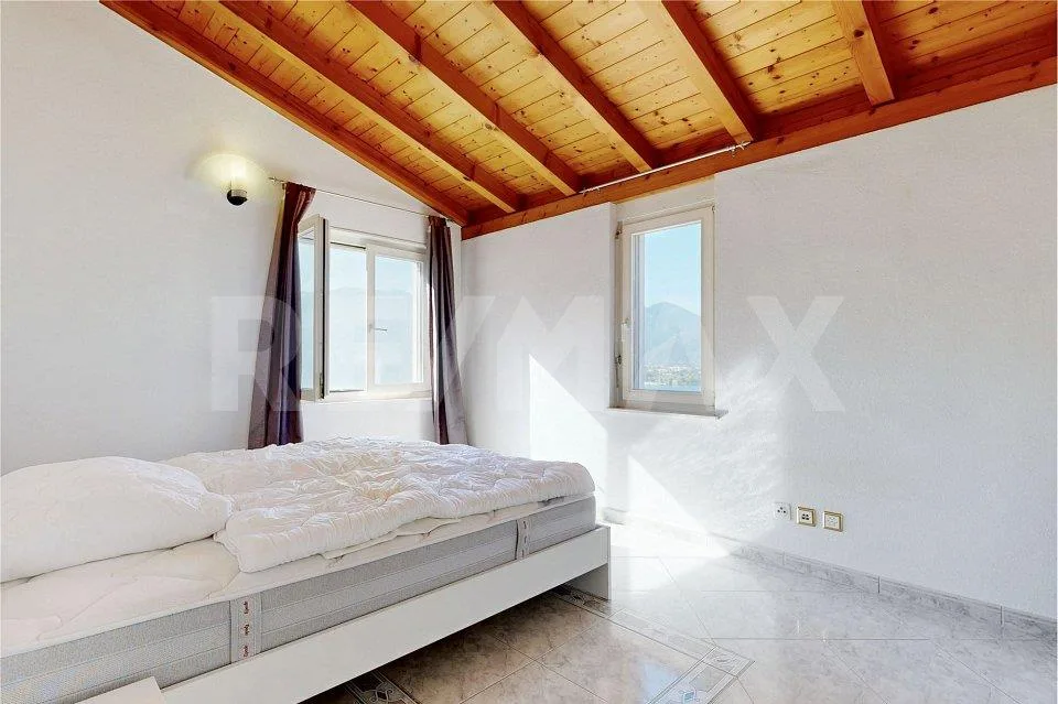 Casa unifamiliare con vista lago – Foto 8 von 13