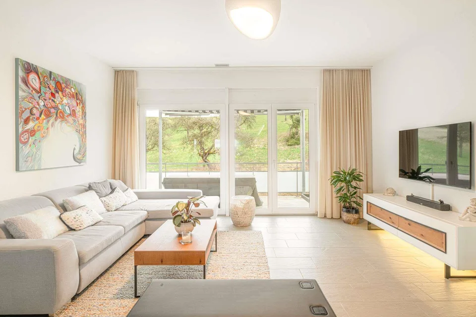 Lichtdurchflutete Attika-Wohnung mit Stadtblick