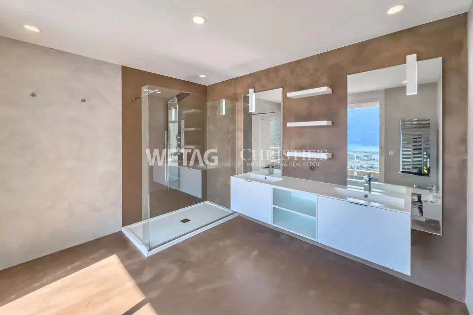 A Lugano: Elegante villa a schiera con giardino privato & ampia vista lago in vendita, anche utilizzabile come seconda casa – foto 7 di 12