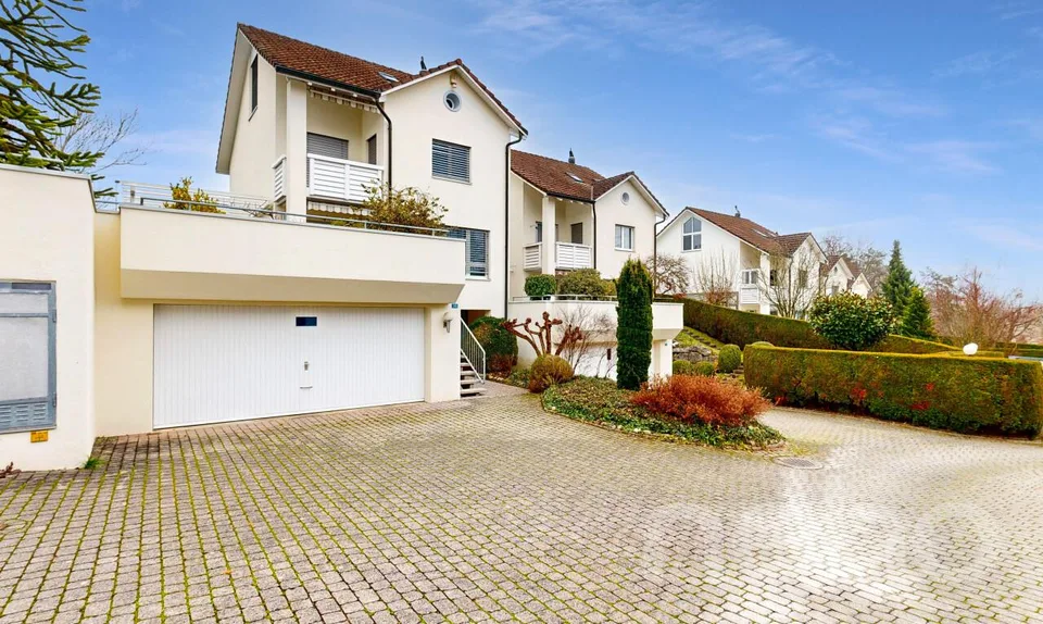 Casa spaziosa con giardino, doppio garage e zona a 30 km/h