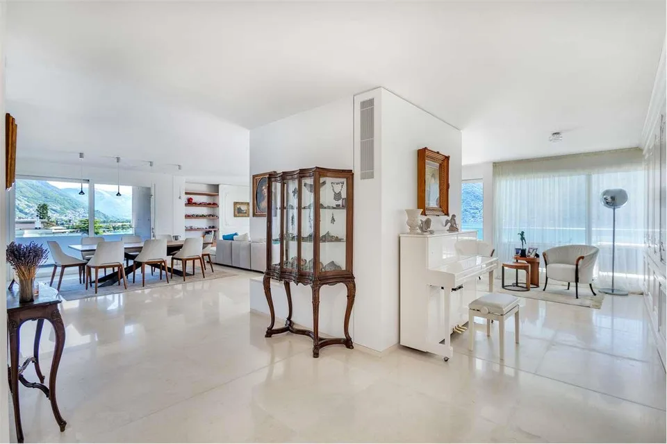Meraviglioso appartamento attico di 6.5 locali con vista lago a Minusi – foto 7 di 13