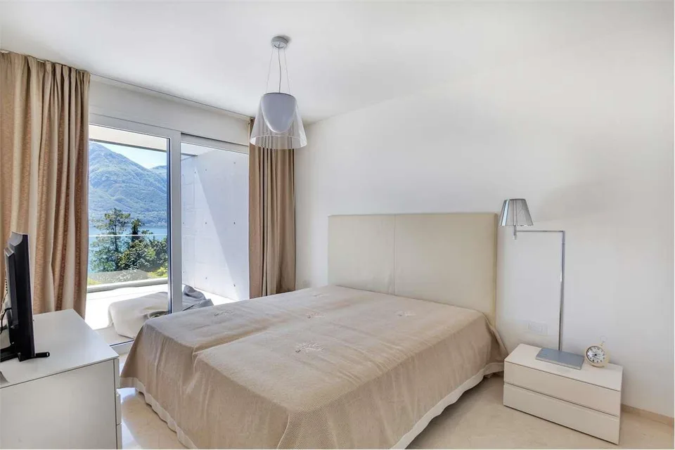 Meraviglioso appartamento attico di 6.5 locali con vista lago a Minusi – foto 10 di 13