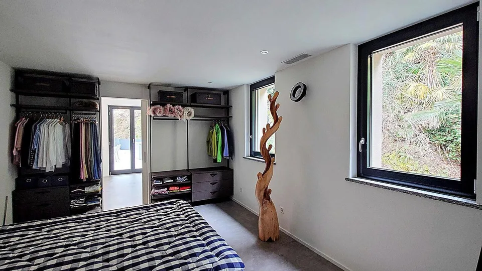 3.5-Zimmerwohnung mit grenzenloser Aussicht und zeitloser Architektur