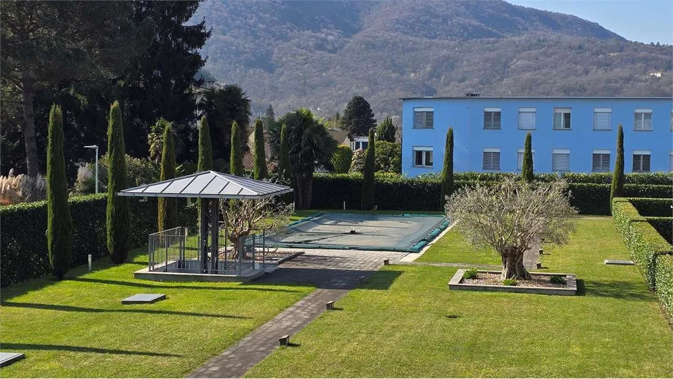 CASLANO - GROßZÜGIGES 6.5 ZIMMER-WOHNUNG MIT SCHWIMMBAD ZUM VERKAUF