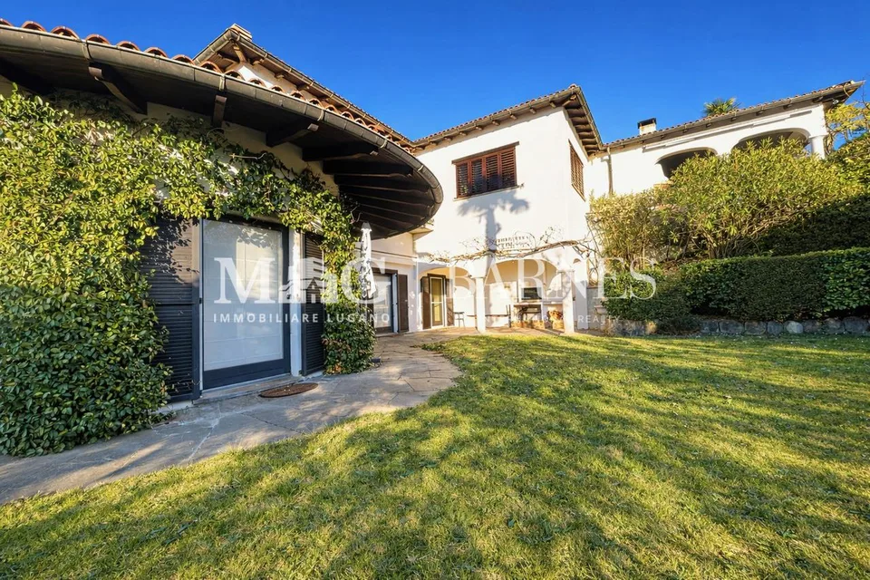 Comano: Appartamento 4.5/5.5 locali con giardino privato e piscina