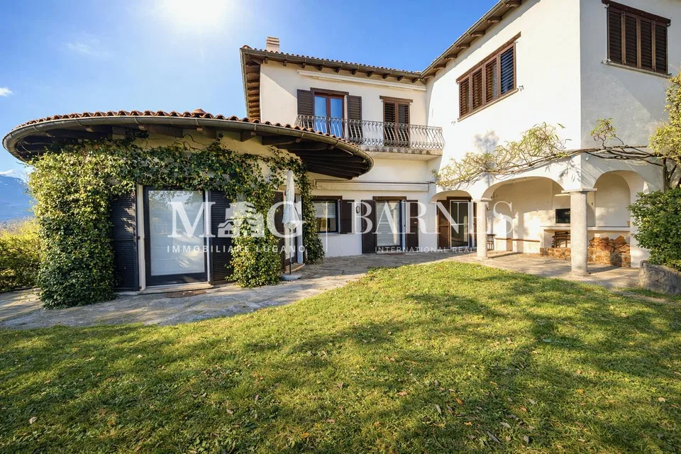 Comano: Appartamento 4.5/5.5 locali con giardino privato e piscina