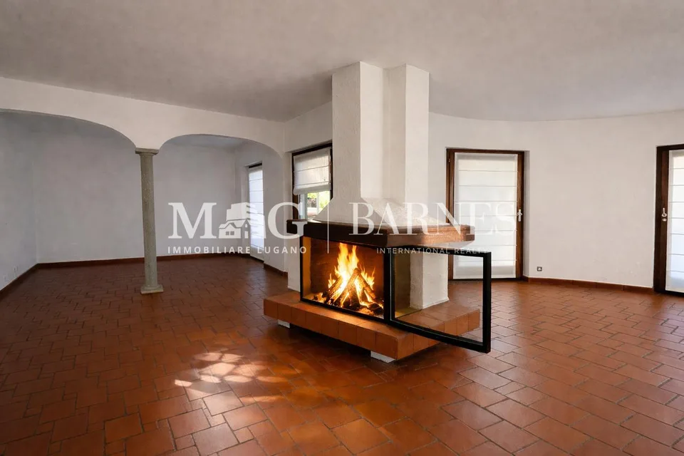 Comano: Appartamento 4.5/5.5 locali con giardino privato e piscina