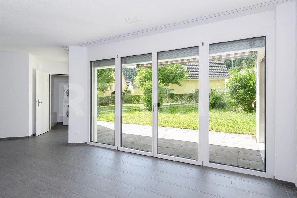 Appartamento moderno 2.5 locali con giardino
