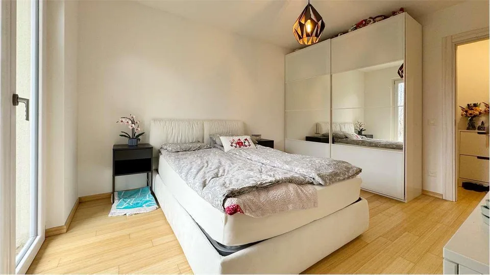 Appartamento in vendita da 2.5 locali con giardino privato – foto 7 di 8
