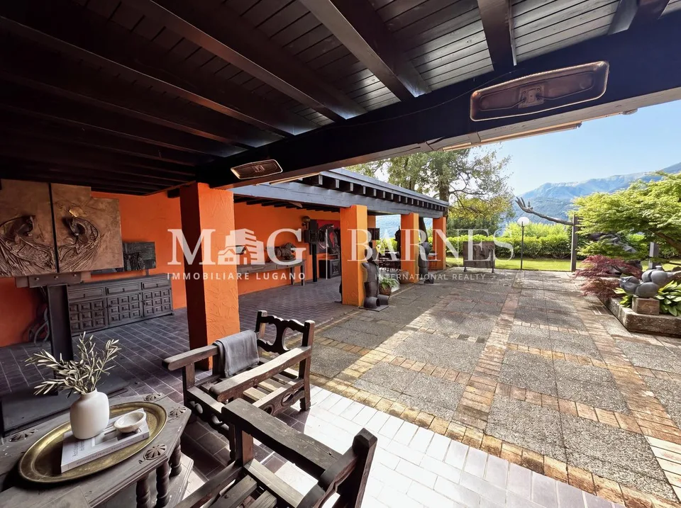 Villa d'autore a Comano con giardino e vista aperta, da rinnovare
