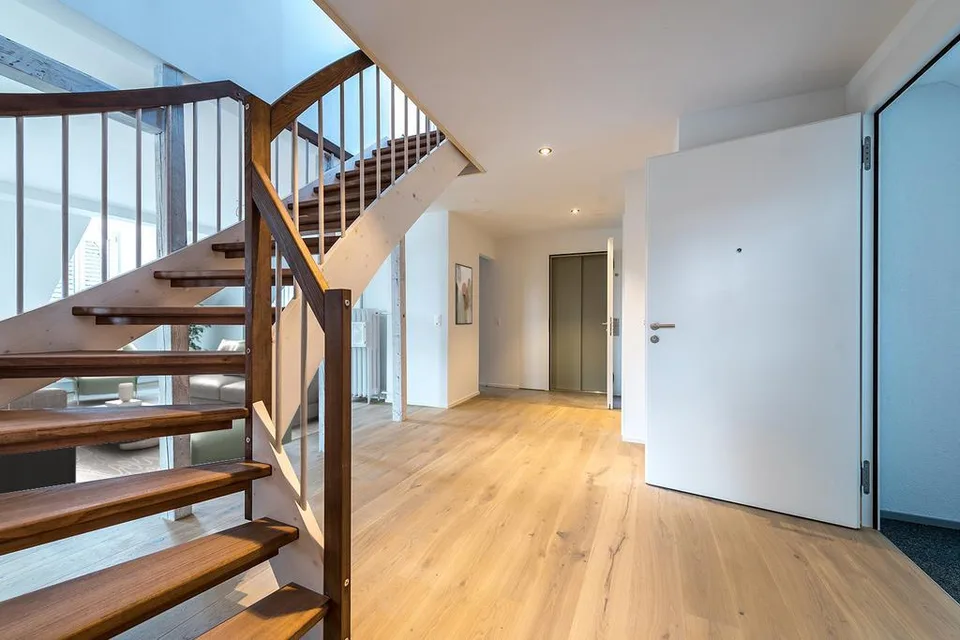 Edle Dachwohnung mit Seesicht an bester Zürcher Citylage