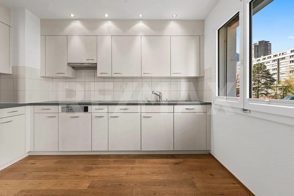 Appartement 5½ pièces avec cave et place de parking souterrain - espace pour toute la famille