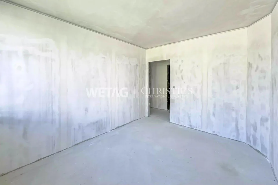 In Lugano steht ein modernes, im Rohbau befindliches Penthouse mit Blick über die Stadt & den See zum Verkauf – Foto 10 von 11