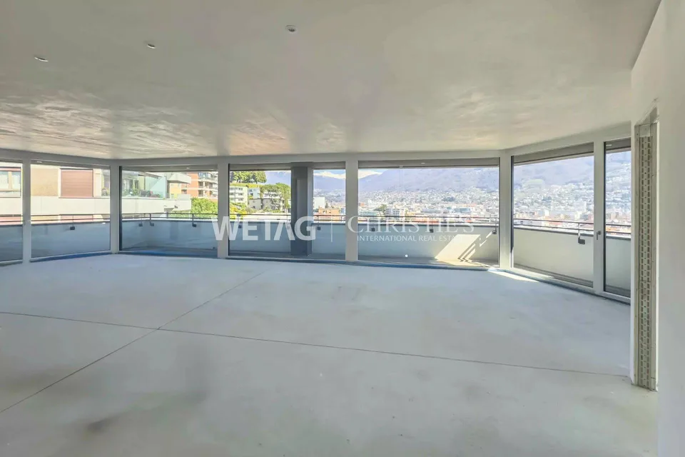 In Lugano steht ein modernes, im Rohbau befindliches Penthouse mit Blick über die Stadt & den See zum Verkauf – Foto 8 von 11