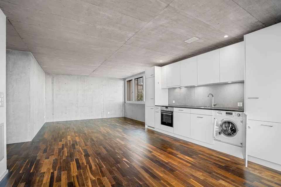 Appartement lumineux 2.5 pièces avec cuisine moderne et espace de séjour privé