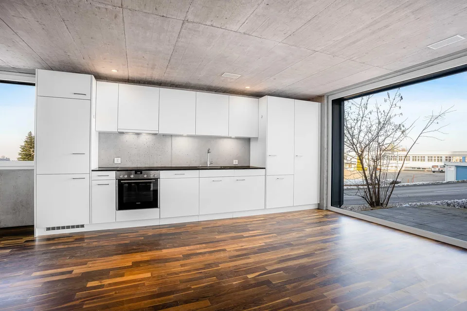 Appartement lumineux 2.5 pièces avec cuisine moderne et espace de séjour privé