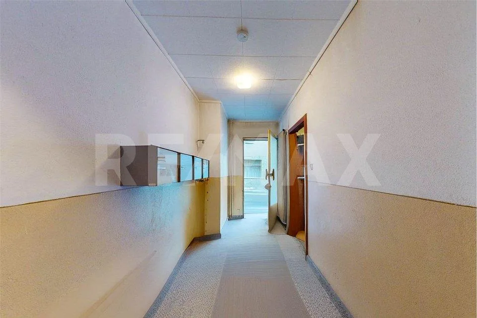 Casa con 3 appartamenti e negozio