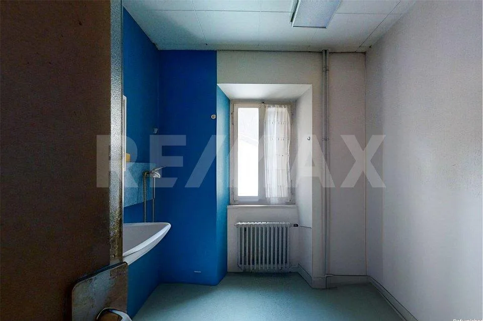 Casa con 3 appartamenti e negozio – foto 6 di 13