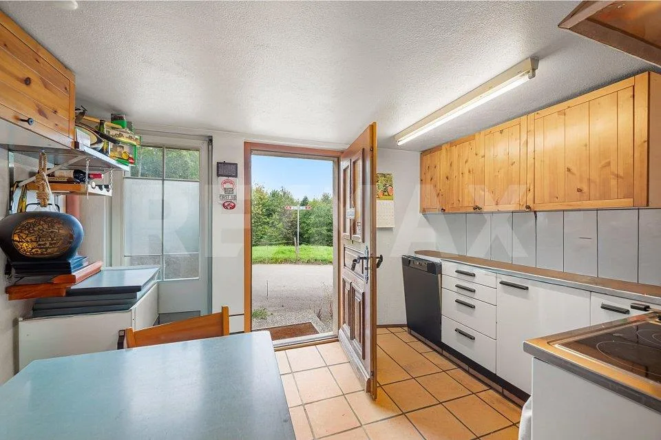 Découvrez cette charmante maison mitoyenne avec vue imprenable sur les Préalpes !