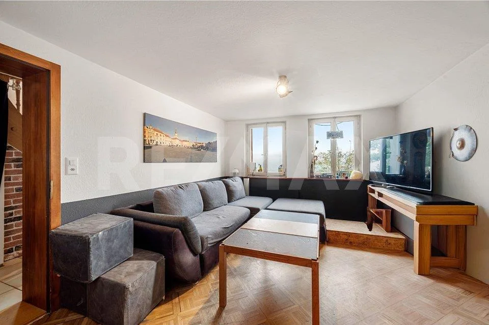 Découvrez cette charmante maison mitoyenne avec vue imprenable sur les Préalpes !
