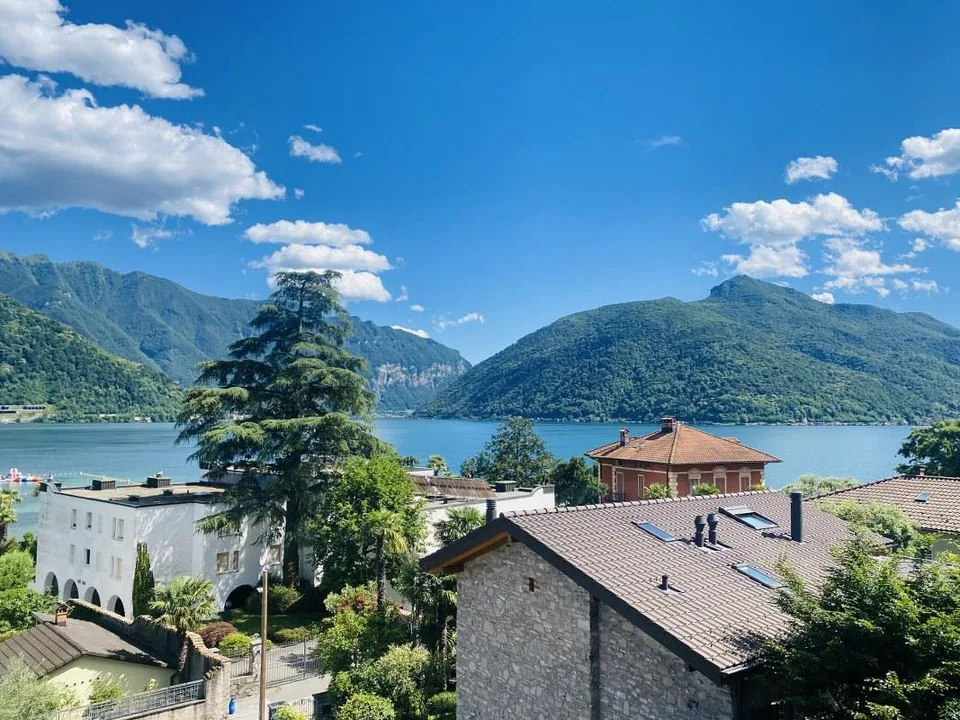 SPLENDIDO ATTICO - 5 LOCALI CON TERRAZZA PANORAMICA  SUL LAGO