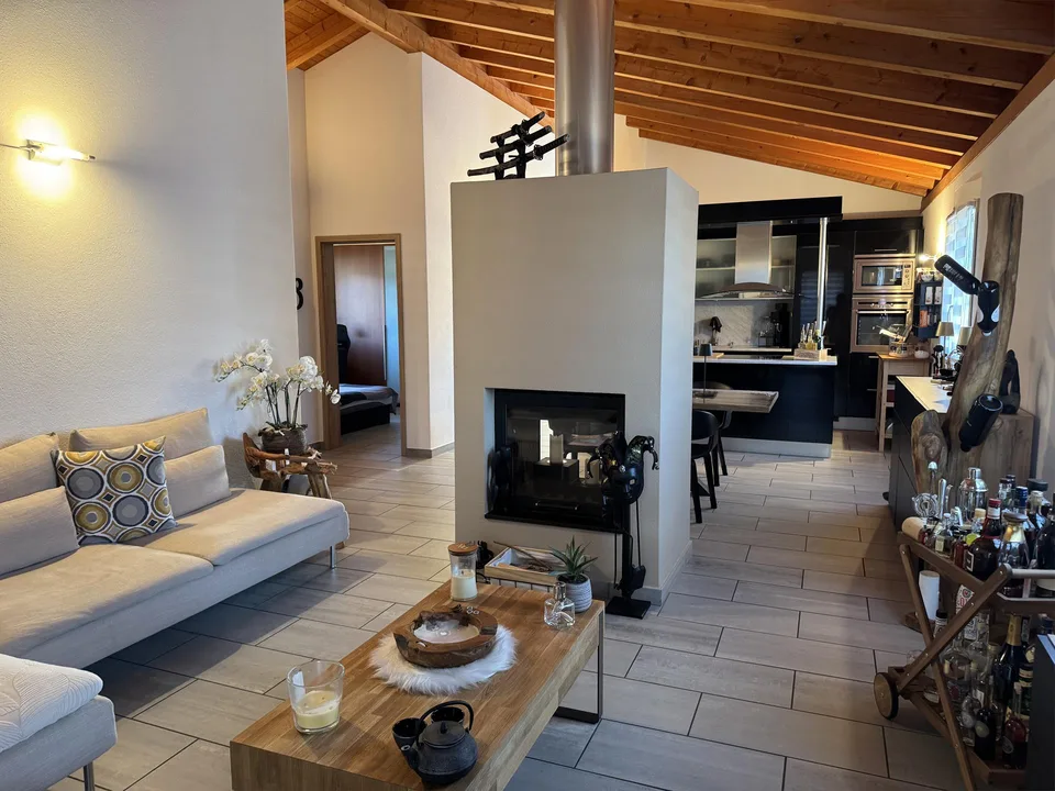 Appartement mansardé avec terrasse et vue dégagée