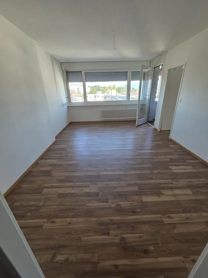 Au centre de Malley splendide appartement renové avec balcon et vue