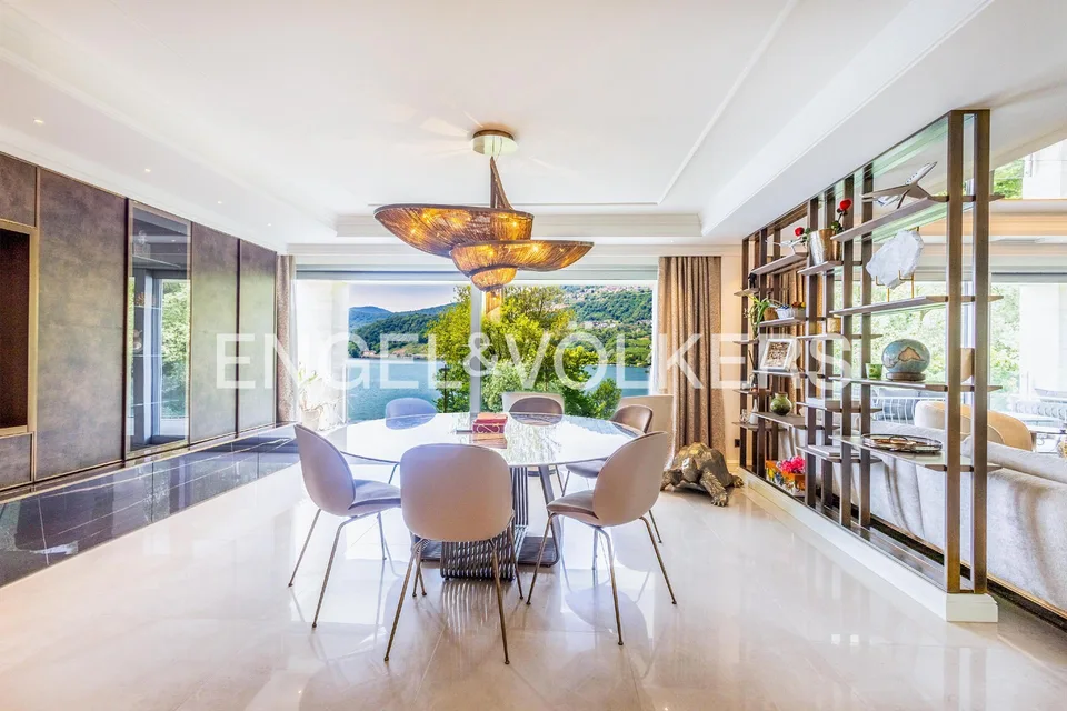 Prestigious attic apartment with lake view and rooftop terrace