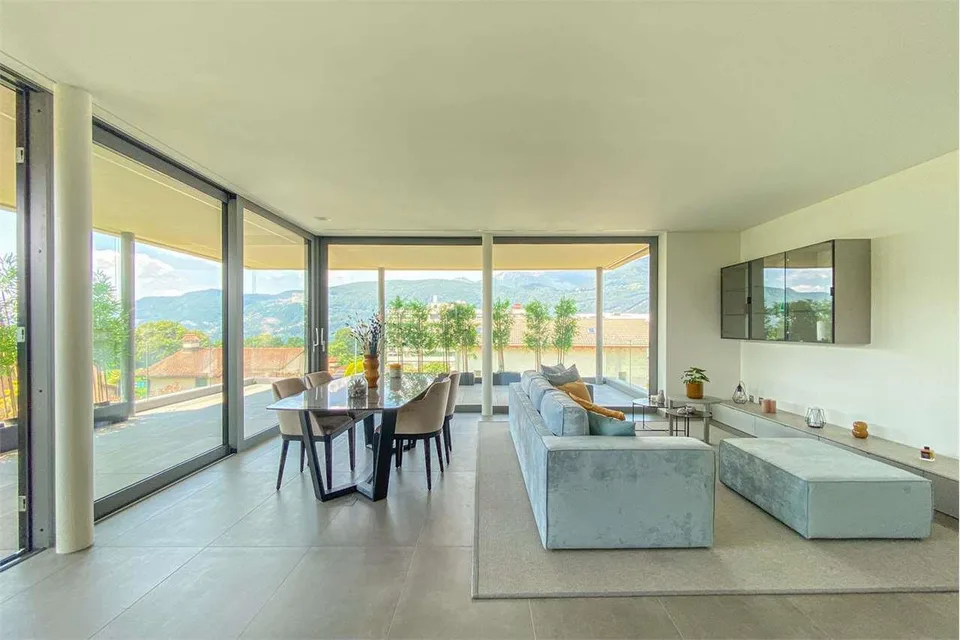 Comano: moderno 3.5 loc. di pregio con ampia terrazza