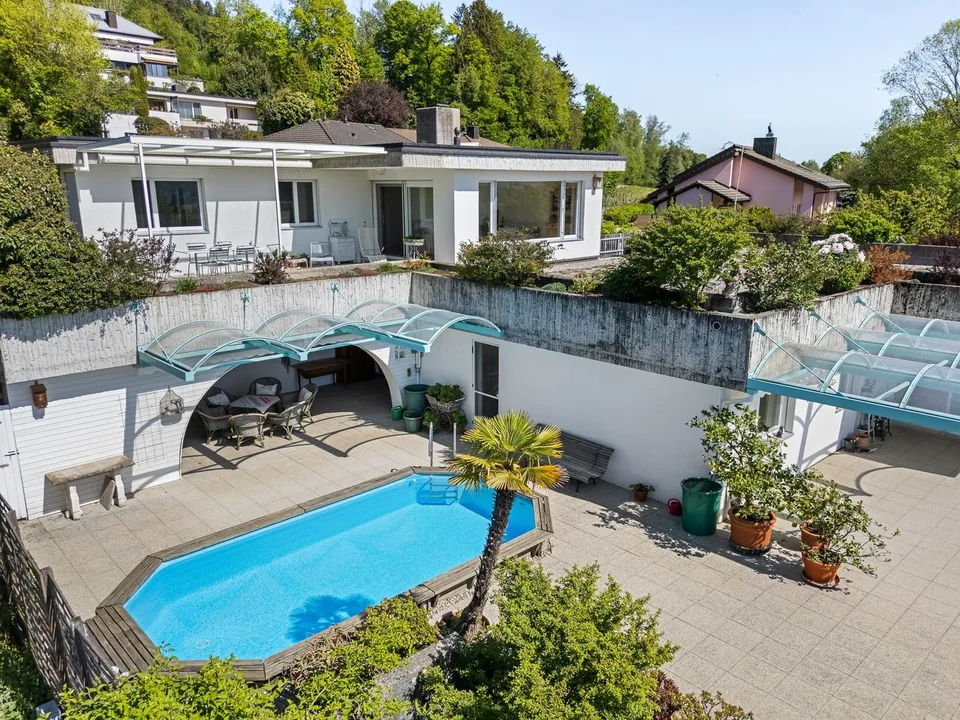 Casa a terrazza con vista panoramica, piscina e terrazza soleggiata