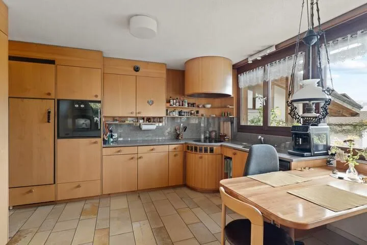 ECO-LIVING WITH A VIEW: A FAMILY HOME WITH A PV SYSTEM AND A TOP PANORAMIC LOCATION