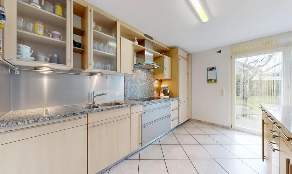 Freistehendes Einfamilienhaus mit sonnigem Garten und Wintergarten – Foto 7 von 18