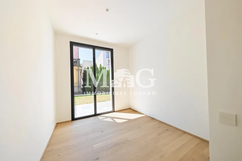 Lugano Centro: Appartamento 4.5 locali con giardino vicino al lago – photo 7 sur 11