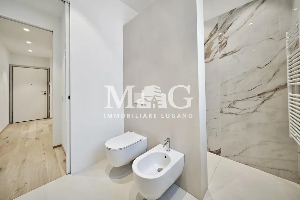 Lugano Centro: Appartamento 4.5 locali con giardino vicino al lago – photo 9 sur 11